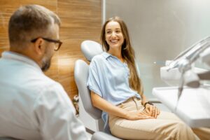 a patient speaking with their cosmetic dentist